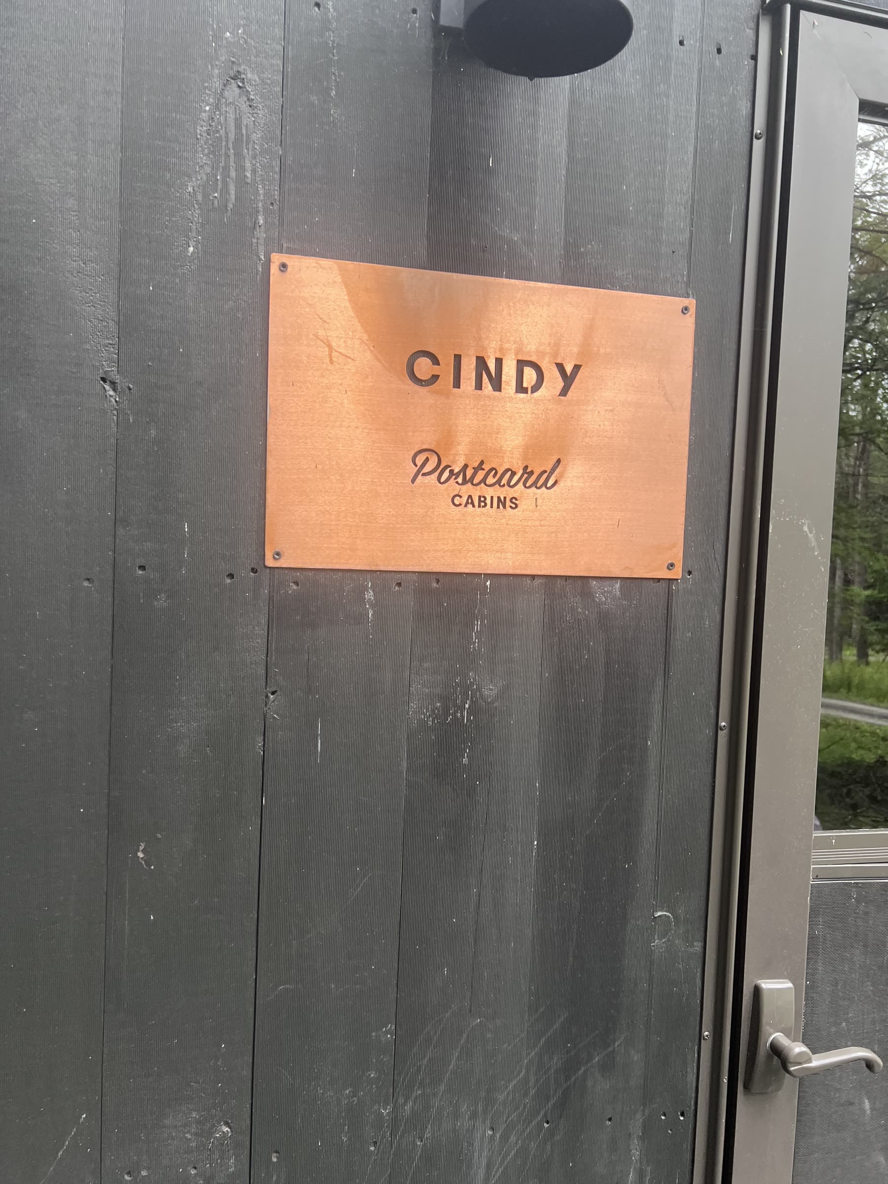 Copper sign naming our tiny cabin Cindy at Postcard Cabins Western Catskills